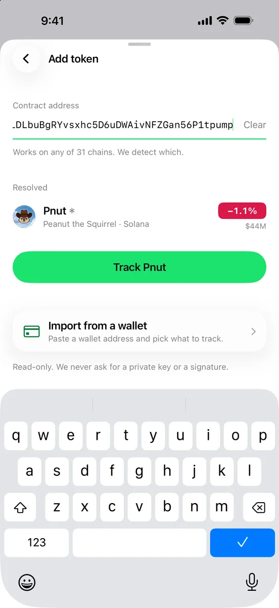 Add token screen with a pasted contract address and the matching coin preview